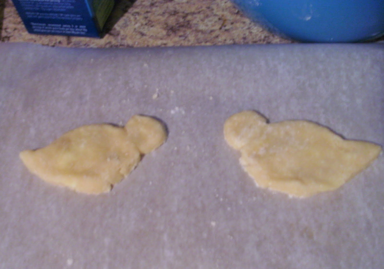 Attach the circles to the half-hearts of cookie